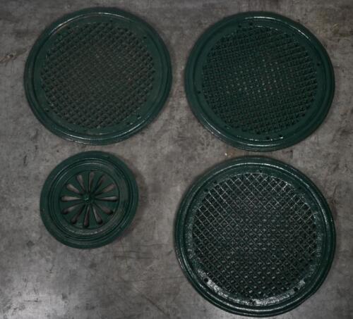 ARCHITECTURAL: Four Victorian era cast iron architectural elements, likely ceiling roses, 3x large measure 48cm diameter each, smaller measures approx 31cm diameter.