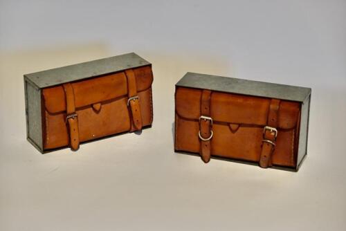 78 · TOOL POUCHES: Two modern thick leather tool pouches in galvanised metal cases [Sydney]