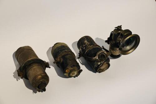 93 · LAMP: A vintage Panther Birmingham acetylene lamp and three various tanks [Sydney]