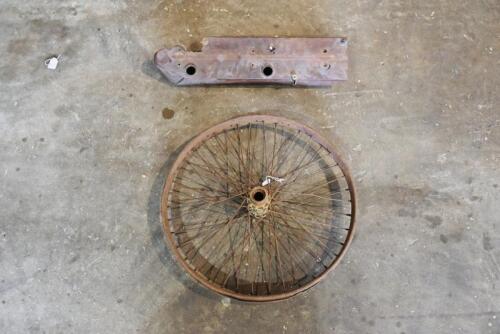 96 · TRIUMPH: Two veteran parts (circa 1910-15), believed Triumph, including a tank suitable for fittings and a 40 spoke rear wheel [Sydney]