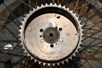 AJS: A single 19 inch, 40 spoke AJS&nbsp;rear wheel, believed to be 1925/1926, complete with bearings, reproduction rear brake and sprocket and brake plate [Sydney] - 2