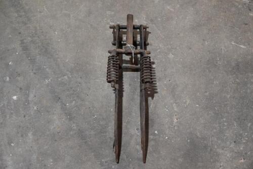 144 · Forks: A circa 1920's pair of forks with springs, suited to a 24" wheel [Sydney]