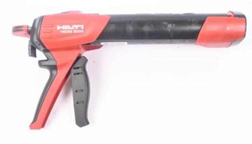 ADHESIVE DISPENSER: A Hilti HDM 500 manual adhesive dispenser.