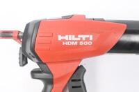ADHESIVE DISPENSER: A Hilti HDM 500 manual adhesive dispenser. - 2