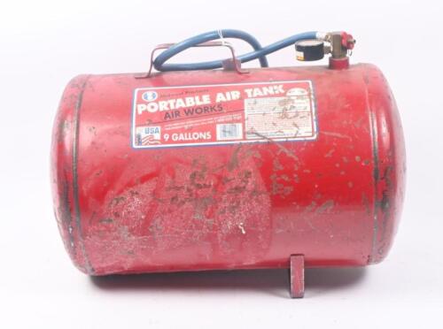 AIR TANK: A nine gallon portable air tank by Mid West Products USA.