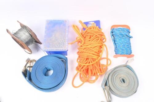 CHAIN & ROPE: A assorted selection of chain and rope along with two ratchet straps lacking ratchets.