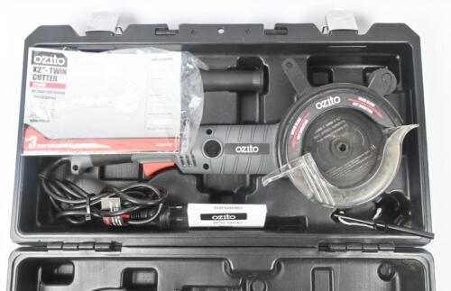 OZITO CUTTER: An Ozito X2 Twin Cutter within case with manual, cutter, side handle, wrench and wax sticks