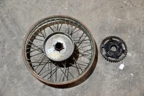 146 · Royal Enfield: A 19", 40 spoke Royal Enfield rear wheel suitable for a Norton, Panther or Brough Superior with original sprocket and 8" reproduction cast iron brake drum [Sydney]