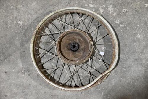 151 · TRIUMPH: A Triumph front wheel, circa 1950's [Sydney]