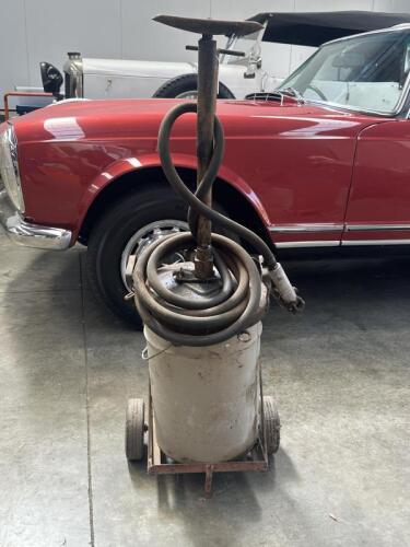 TROLLEY: A oil trolley with a Mobil Mobilgrease 20kg drum with pump and hose.