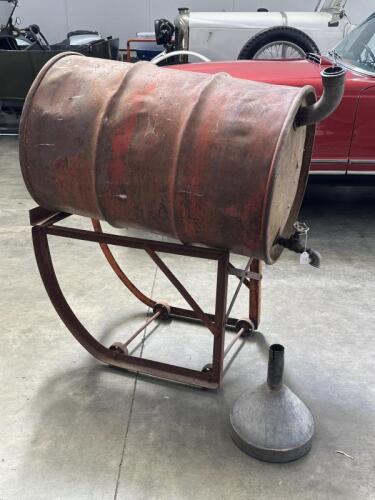 OIL DRUM: A 44 gallon drum with trolley and funnel