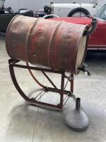 OIL DRUM: A 44 gallon drum with trolley and funnel