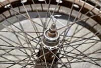 ROVER: A rear wheel believed to be Rover and guard section. 22" wheel, 40 spoke, complete with bearings and belt drive [Sydney] - 7
