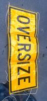 OVERSIZE LOAD: A large 'Oversize Load Ahead' metal sign mounted to timber stand along with flag set and banner - 3
