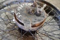NORTON: A 19", 40 spoke Norton front wheel circa 1930's complete with speedo drive and&nbsp;brake drum [Sydney] - 2