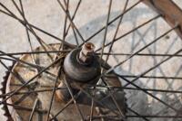 DOUGLAS: A 40&nbsp;spoke 20" rear wheel with brake drum complete with axle which spins, beaded rim, believed to be Douglas Model EW [Sydney] - 5