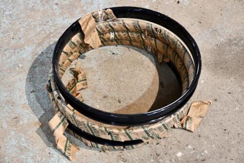 248 · RIMS: A group of four brand new 21" universal rims [Sydney]