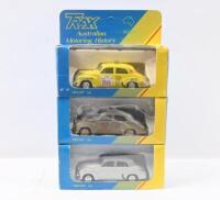 TRAX: set of 3 1:43 Trax "Australian Motoring History" series FJ Holden Sedans, 1 Yellow Limited Edition 1988 Redex Variety Club Bash, 1 Brown No 260, 1954 Redex Trial, and 1 Light and Dark Grey 2 tone Sedan, no Cs of A, all clear display boxed.