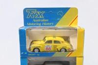 TRAX: set of 3 1:43 Trax "Australian Motoring History" series FJ Holden Sedans, 1 Yellow Limited Edition 1988 Redex Variety Club Bash, 1 Brown No 260, 1954 Redex Trial, and 1 Light and Dark Grey 2 tone Sedan, no Cs of A, all clear display boxed. - 2