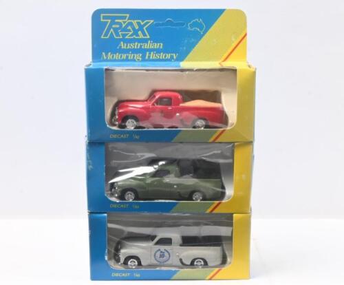 TRAX: set of 3 1:43 Trax "Australian Motoring History" series FJ Holden Utes, 1 Grey Trax 10th Anniversary Commemorative Edition with Black tonneau cover, 1 Olive Green with Black tonneau cover, and 1 Red Royal Mail with Beige tonneau cover, no Cs of A, all clear display boxed.