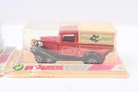 MAJORETTE VANS: Set of 2 Majorette 1:60 scale Ford Model A Tea Shop promotional vans, 1 Blue with Cream delivery canopy, and 1 Red with cream delivery canopy, both clear display boxed. - 3