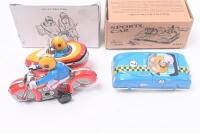 TIN COLLECTIBLES: set of 2 Tin collectible models, 1 1:55 scale Tin Treasures Press N Go blue open racing car #7, with forward motion if driver's head is pushed downwards, and 1 unknown scale multi coloured clockwork motorbike and sidecar, including key, - 2