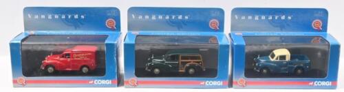 451 · MORRIS MINOR: Set of 3 1:43 scale Corgi Vanguards Limited Edition The B.M.C. Collection models, 1 Stratford Blue with White Roof Morris 1000 Pick up, 1 Dark Green with wood inserts Morris Minor Traveller, and 1 Red Co-Operative Radio & Television Morris 1000 Van, all clear custom display boxed.