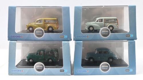 485 · OXFORD MORRIS MINOR: Set of 4 1:76 scale Oxford Automobile Company Morris Minor models, consisting of 1 Smoke Grey Traveller, 1 Limeflower Traveller, 1 Aqua Traveller, and 1 Lowlight Thames Blue Saloon, all clear display boxed.