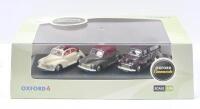 OXFORD MORRIS MINOR: Set of 3 1:76 scale Oxford Automobile Commercials Morris Minor models, consisting of 1 Maroon Traveller, 1 Grey and Maroon Convertible with roof closed, and 1 Cream and Maroon Convertible with roof open, clear display boxed.
