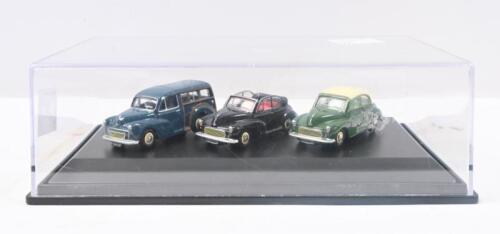 OXFORD MORRIS MINOR: Set of 3 1:76 scale Oxford Automobile Commercials Morris Minor models, consisting of 1 Aqua Traveller, 1 Green and Cream Convertible with roof closed, and 1 Black Convertible with roof open, clear display boxed.