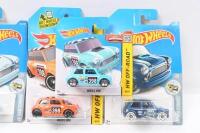 HOT WHEELS MINIS: Set of 5 1:64 scale Hot Wheels Morris Minis, consisting of 2 HW Off-Road Series, 1 Sky Blue and 1 Orange, both #398, 2 HW Snow Stormers Series, 1 Sky Blue and 1 Black, both #333, and 1 City Colour Shifter Series, changes colour from Gree - 2