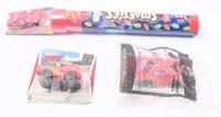 LIGHTNING MCQUEEN: Set of 3 Lightning McQueen items, consisting of 1 Disney Pixar plastic car, clear display packaged, 1 2006 McDonalds Happy Meal plastic car, packaged in a sealr plastic bag, and 1 plastic car attached to a tube of Nestle Smarties, still