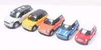 MINIS: Collection of 5 various scale new style Minis, consisting of 2 Welly Mini Coopers, 1 RMZ City Grey and Black battery operated Clubman 5 door, 1 Maisto Blue and White Cooper S sedan, and 1 unknown brand Red and White Cooper S sedan, all loose, no bo
