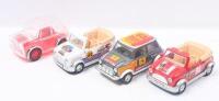 MINIS: Collection of 4 1:24 Scale Minis, consisting of 2 racing Convertibles, 1 White and 1 Red with open roofs, 1 racing Mini, and 1 completley transparent Mini, all loose, no boxes.