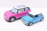 MINIS: 2 Minis, 1 1:24 Burago old style Light Blue and White Mini Cooper, and 1 1:18 scale plastic unknown brand new style Pink and White sedan, both loose, no boxes,