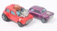 FAST MINIS: 2 fast Minis, 1 1:64 scale Red Matchbox Superfast 1975 Diecast MINI-HA-HA No 14 Mini Cooper Race Car, and 1 1:72 scale Purple Corgi Juniors Whizz Wheels Mini Cooper S, not boxed.