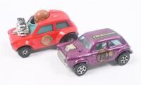 FAST MINIS: 2 fast Minis, 1 1:64 scale Red Matchbox Superfast 1975 Diecast MINI-HA-HA No 14 Mini Cooper Race Car, and 1 1:72 scale Purple Corgi Juniors Whizz Wheels Mini Cooper S, not boxed. - 2