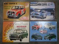 SIGNS: 4 various reproduction Mini and Cooper S Tin advertisement signs, some embossed, largest 31.5 cm high, by 40.5 cm wide.