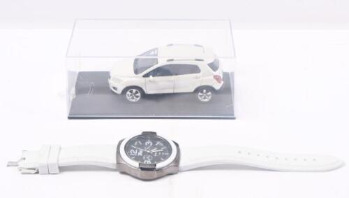 TRAX: 1:43 scale Trax TT01 Series Snow Flake Pearl White 2013 Holden Trax SUV, no C of A, clear case. Accompanied by matching wrist watch.