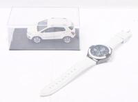 TRAX: 1:43 scale Trax TT01 Series Snow Flake Pearl White 2013 Holden Trax SUV, no C of A, clear case. Accompanied by matching wrist watch. - 2