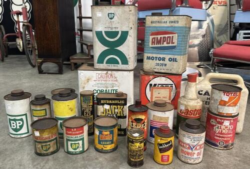 GARAGENALIA: A collection of garagenalia items including oil and grease tins and others. [SALEROOM NOTICE]