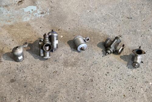 354 · AMAL: Three remote needle racing Amal carburettors, incomplete [Sydney]