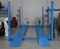 HOIST: A four post 240v hydraulic&nbsp;vehicle hoist 3600kg load capacity, complete with approach ramps and moving dollies. [Location: Mount Waverley]