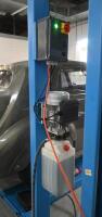 HOIST: A four post 240v hydraulic&nbsp;vehicle hoist 3600kg load capacity, complete with approach ramps and moving dollies. [Location: Mount Waverley] - 4