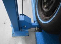 HOIST: A four post 240v hydraulic&nbsp;vehicle hoist 3600kg load capacity, complete with approach ramps and moving dollies. [Location: Mount Waverley] - 3