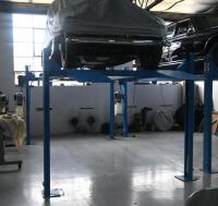 HOIST: A four post 240v hydraulic&nbsp;vehicle hoist 3600kg load capacity, complete with approach ramps and moving dollies. [Location: Mount Waverley] - 7