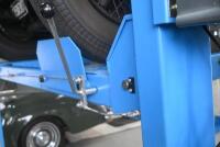 HOIST: A four post 240v hydraulic&nbsp;vehicle hoist 3600kg load capacity, complete with approach ramps and moving dollies. [Location: Mount Waverley] - 6