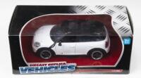 MINI: 1:24 scale Motormax Diecast Replica Vehicles Oxford White 2011 Mini-Cooper S Countryman, boxed.