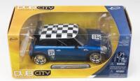 MINI: 1:24 scale JADA Dub City Blue 2007 Mini Cooper S Checkered Roof Raceway #37, boxed.