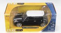 MINI: 1:24 scale JADA Dub City Black 2007 Mini Cooper S, boxed.